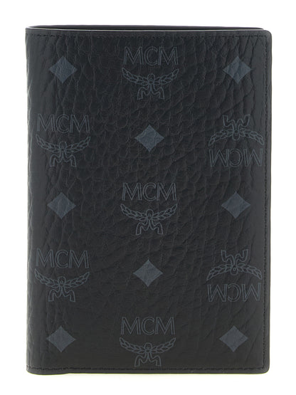 Cardholder Wallet by MCM for men in cotton coated canvas & poly leather black & monogram showcases a distinguished silhouette, artfully capturing the essence of the distinguished Visetos Cotton Coated Canvas & Poly Leather Cardholder Wallet design with functional card-organization.
