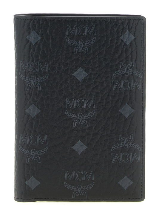 Cardholder Wallet by MCM for men in cotton coated canvas & poly leather black & monogram showcases a distinguished silhouette, artfully capturing the essence of the distinguished Visetos Cotton Coated Canvas & Poly Leather Cardholder Wallet design with functional card-organization.