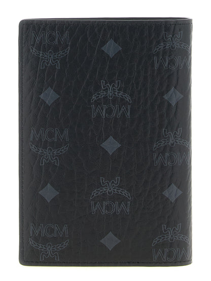 Cardholder Wallet by MCM for men in cotton coated canvas & poly leather black & monogram presents a streamlined silhouette, showcasing the sophisticated design of the Visetos Cotton Coated Canvas & Poly Leather Cardholder Wallet collection with functional card-organization.