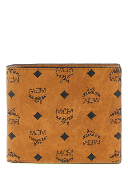 Cardholder Wallet by MCM for men in cotton coated canvas & poly leather brown & monogram presents a streamlined silhouette, showcasing the sophisticated design of the Visetos Cotton Coated Canvas & Poly Leather Cardholder Wallet collection with functional card-organization bifold coin-purse.