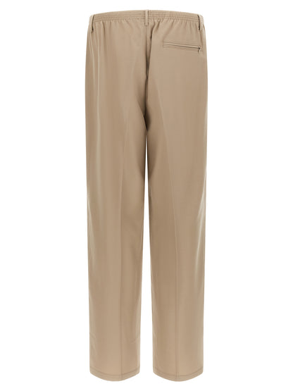 Trousers by CELLAR DOOR for men in virgin wool beige features a tailored silhouette with a tailored wide, defined by its long and a sophisticated .
