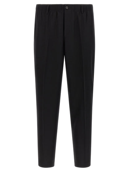 Trousers by CELLAR DOOR for men in virgin wool black features a artisanal silhouette, showcasing a sophisticated tapered-leg with a long and for a artisanal finish.
