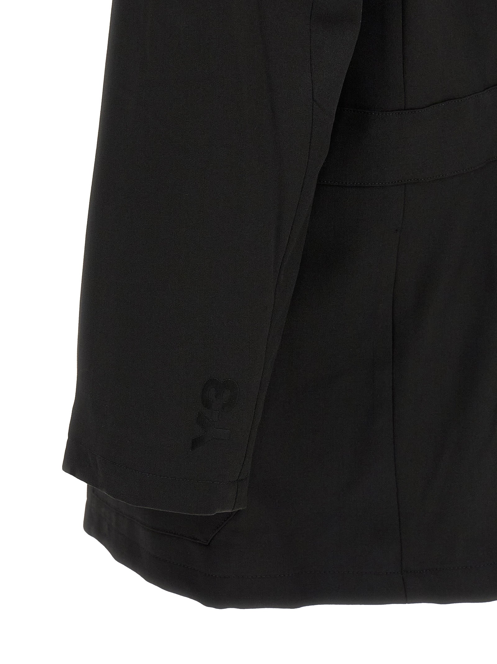 Overcoat by Y-3 for men in polyester viscose wool black features a contemporary silhouette showcasing a contemporary and refined pockets for a sophisticated finish.
