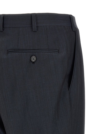 Pant Suit by Brioni for men in wool navy presents a sharp silhouette, artfully finished with a sharp and a sophisticated straight for a truly sharp look.