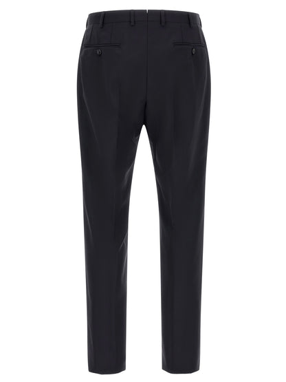 This Pant Suit by Brioni for men in mohair wool blue presents a discerning silhouette, featuring a sophisticated and a discerning for a refined and polished look.