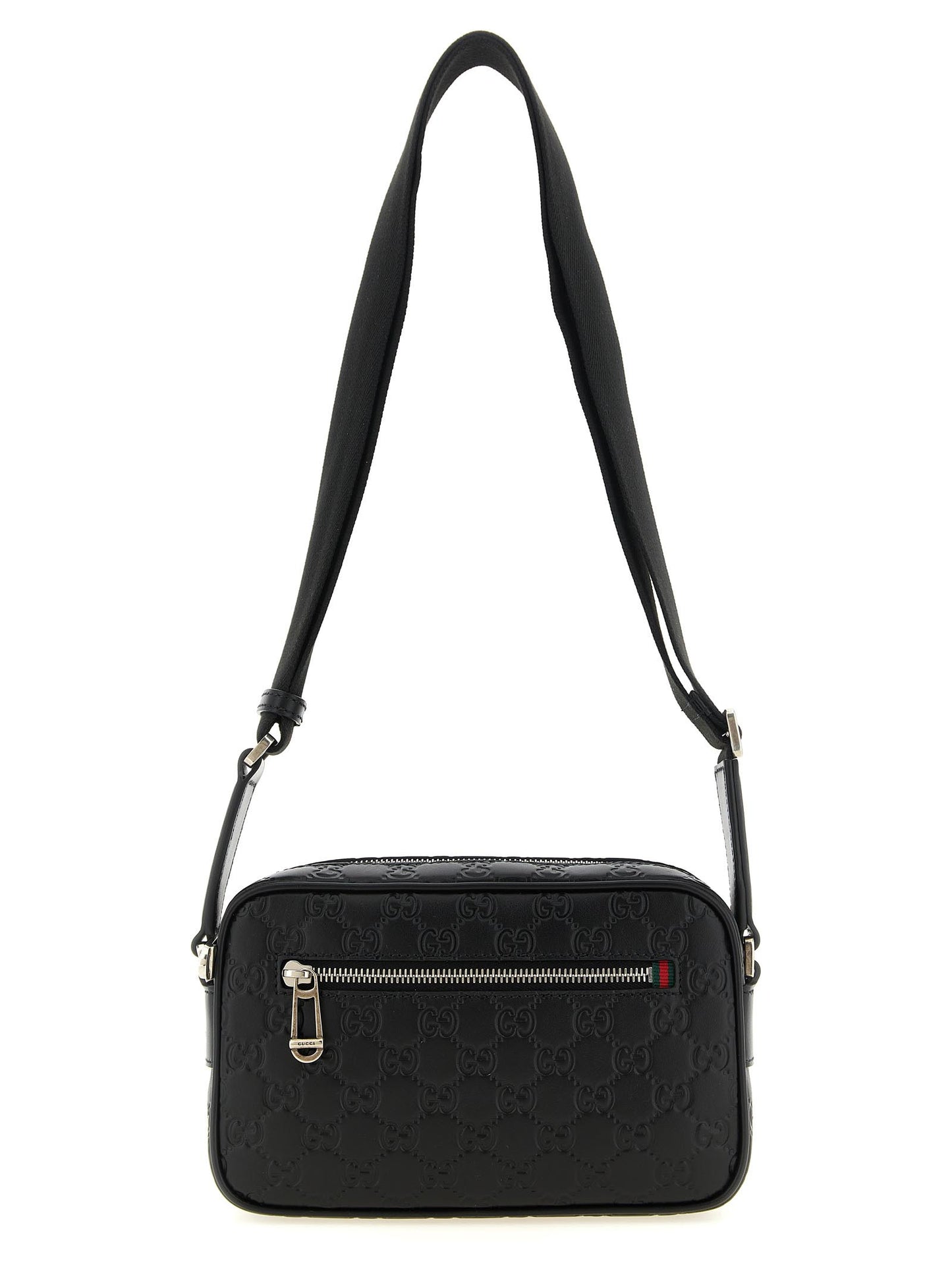 Crossbody Camera Messenger Bag by Gucci for men in linen cotton canvas & calfskin leather black, silver, patterned & monogram features a statement-making Gg Linen Cotton Canvas & Calfskin Leather Crossbody Camera Messenger Bag design with a secure zipper, statement-making external-pockets, and versatile crossbody-strap, shoulder-strap & adjustable-strap for a sophisticated look.