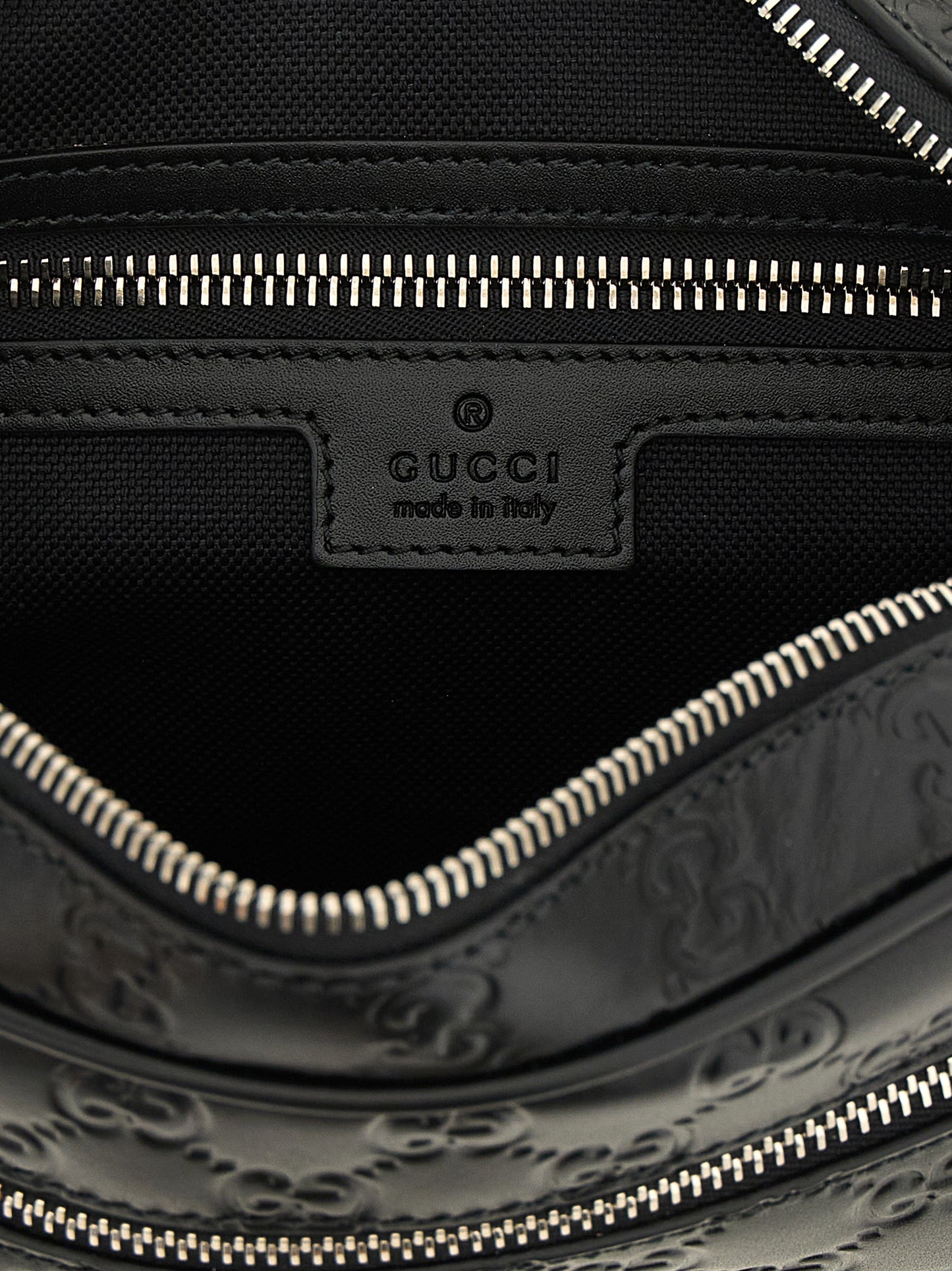 Crossbody Camera Messenger Bag by Gucci for men in linen cotton canvas & calfskin leather black, silver, patterned & monogram features a distinguished Gg Linen Cotton Canvas & Calfskin Leather Crossbody Camera Messenger Bag design with a secure zipper, ample external-pockets, and versatile crossbody-strap, shoulder-strap & adjustable-strap for a distinguished look.