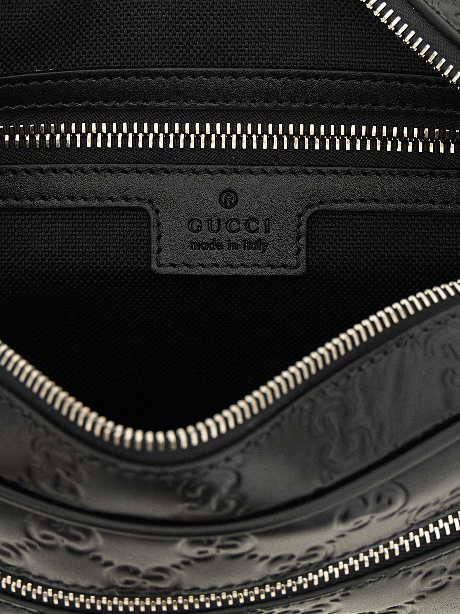 Crossbody Camera Messenger Bag by Gucci for men in linen cotton canvas & calfskin leather black, silver, patterned & monogram features a distinguished Gg Linen Cotton Canvas & Calfskin Leather Crossbody Camera Messenger Bag design with a secure zipper, ample external-pockets, and versatile crossbody-strap, shoulder-strap & adjustable-strap for a distinguished look.