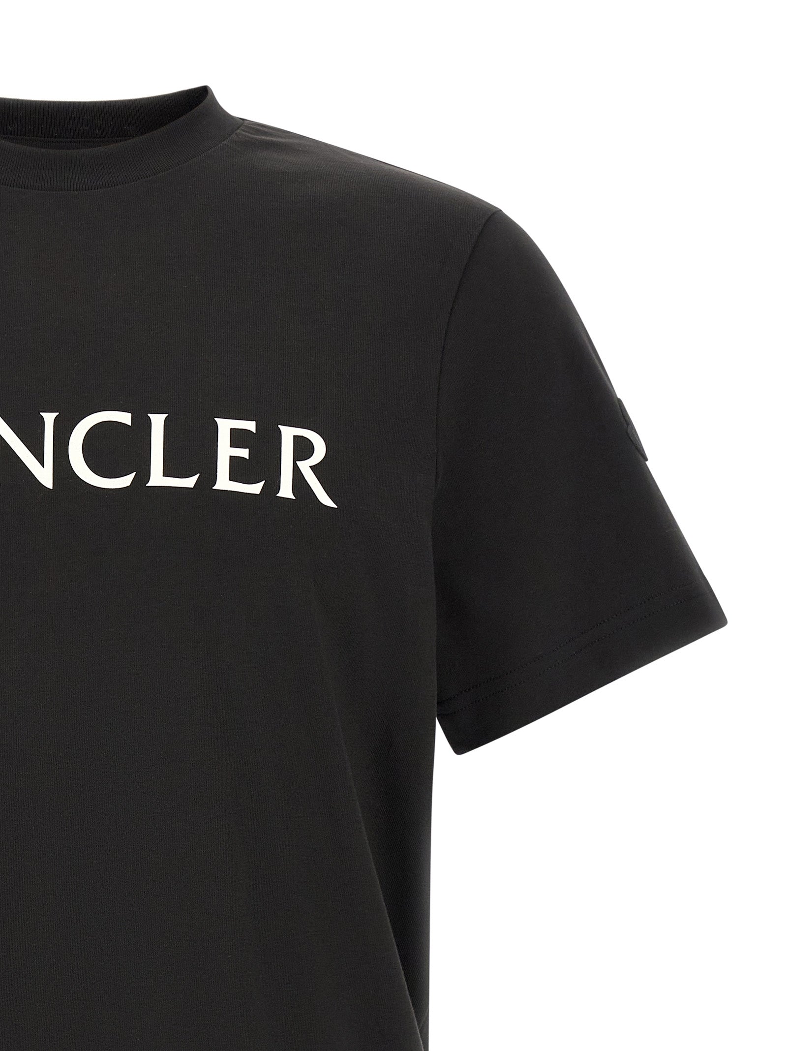 T-Shirt by Moncler for men in cotton felt black, white & print features a plush silhouette, showcasing a sophisticated crew neckline and for a truly plush finish.