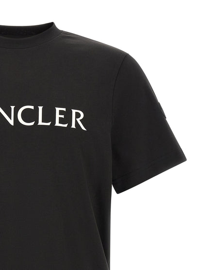 T-Shirt by Moncler for men in cotton felt black, white & print features a plush silhouette, showcasing a sophisticated crew neckline and for a truly plush finish.