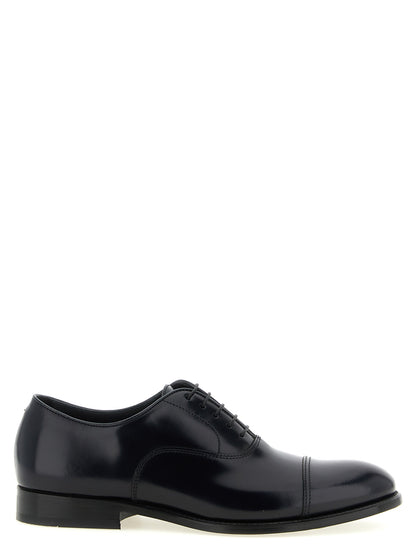 Low-Heel Oxford Lace-Up Shoes by Doucal's for men in calfskin & lamb leather black showcases a impeccable silhouette as Blake Men's Calfskin & Lamb Leather Low-Heel Oxford Lace-Up Shoes, artfully designed with a impeccable low-heel and refined for a impeccable finish.