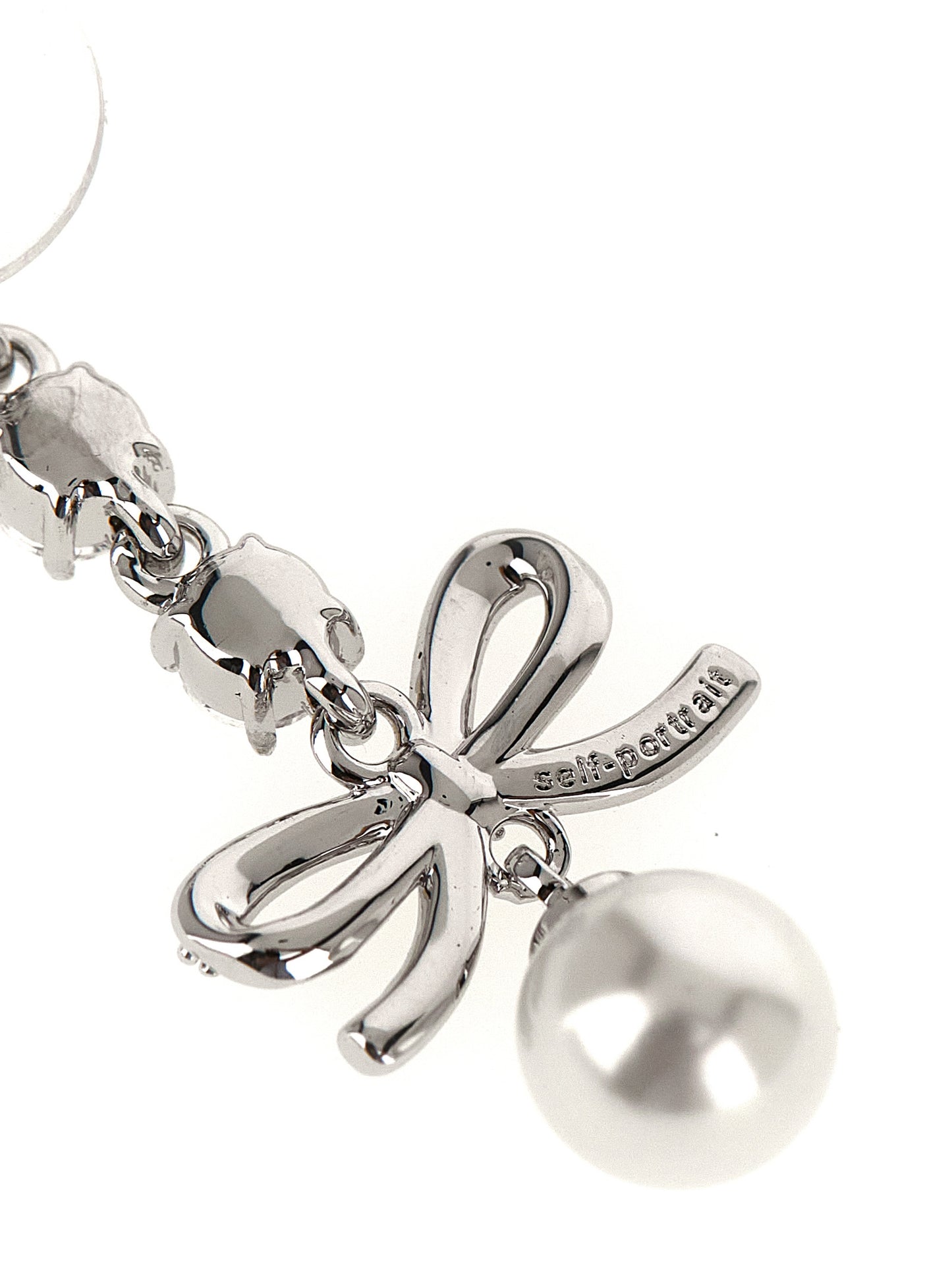 Earrings by Self-Portrait for women in suede lamb leather pearl, silver, white & patterned showcases a captivating silhouette, featuring an captivating drop teardrop from the Women's Drop Teardrop Silver Brass Pearls & Crystal Earrings collection for a captivating finish.