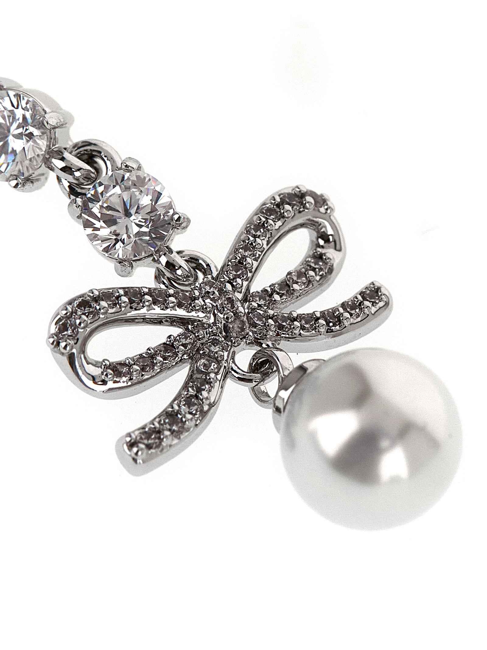 Earrings by Self-Portrait for women in suede lamb leather pearl, silver, white & patterned showcases a artisanal silhouette, artfully capturing the essence of Women's Drop Teardrop Silver Brass Pearls & Crystal Earrings with its exquisite drop teardrop.