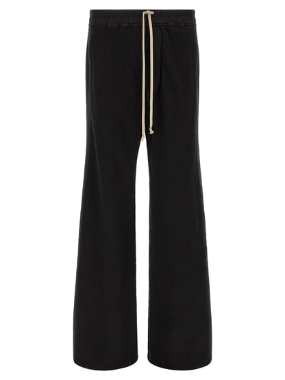 Trousers by DRKSHDW for men in horse leather & cotton black & silver features a artisanal silhouette, showcasing a sophisticated flared & wide with a long and for a artisanal finish.