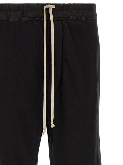 Trousers by DRKSHDW for men in horse leather & cotton black & silver features a sculptural silhouette, showcasing a sculptural flared & wide and long with a sophisticated for a sculptural finish.