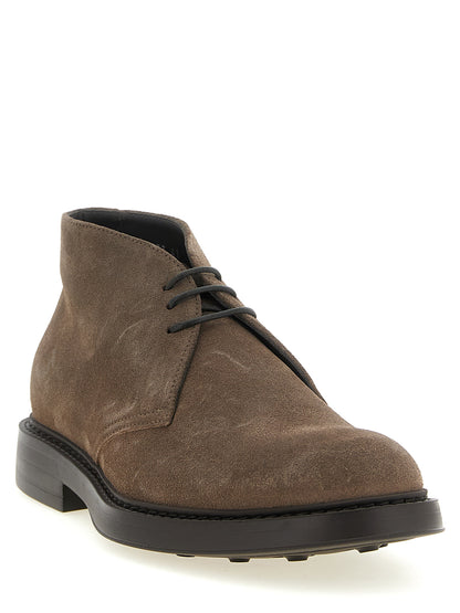Ankle Chukka-Desert Boots by Doucal's for men in suede lamb leather brown features an effortless chic silhouette from the Men's Suede Lamb Leather Ankle Chukka-Desert Boots collection, showcasing a effortless chic and refined for an effortless chic look.