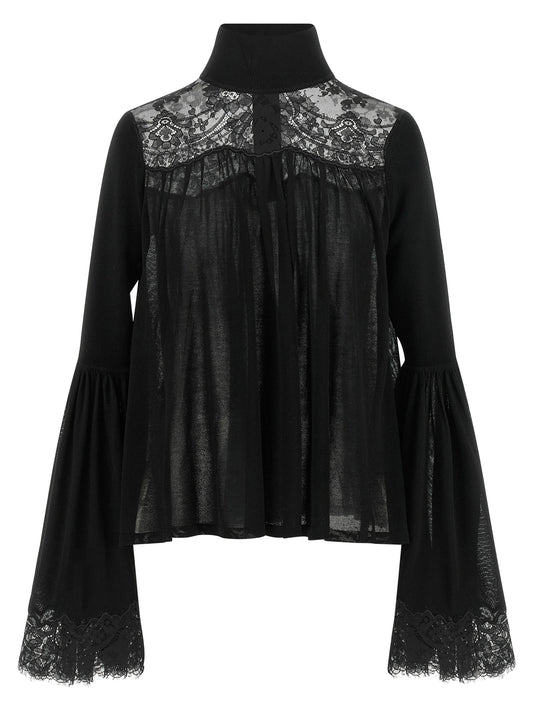 Blouse by Zimmermann for women in lace & lyocell black, transparent & floral showcases a sharp silhouette, elegantly detailed with a sharp high-neck neckline and sharp long-sleeve.