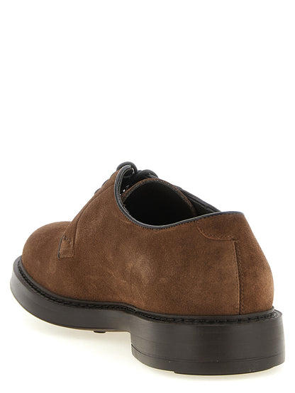 Derby Shoes by Doucal's for men in suede lamb leather black & brown features an dynamic silhouette from the Blake Men's Suede Lamb Leather Derby Shoes collection, defined by a dynamic and for a dynamic look.