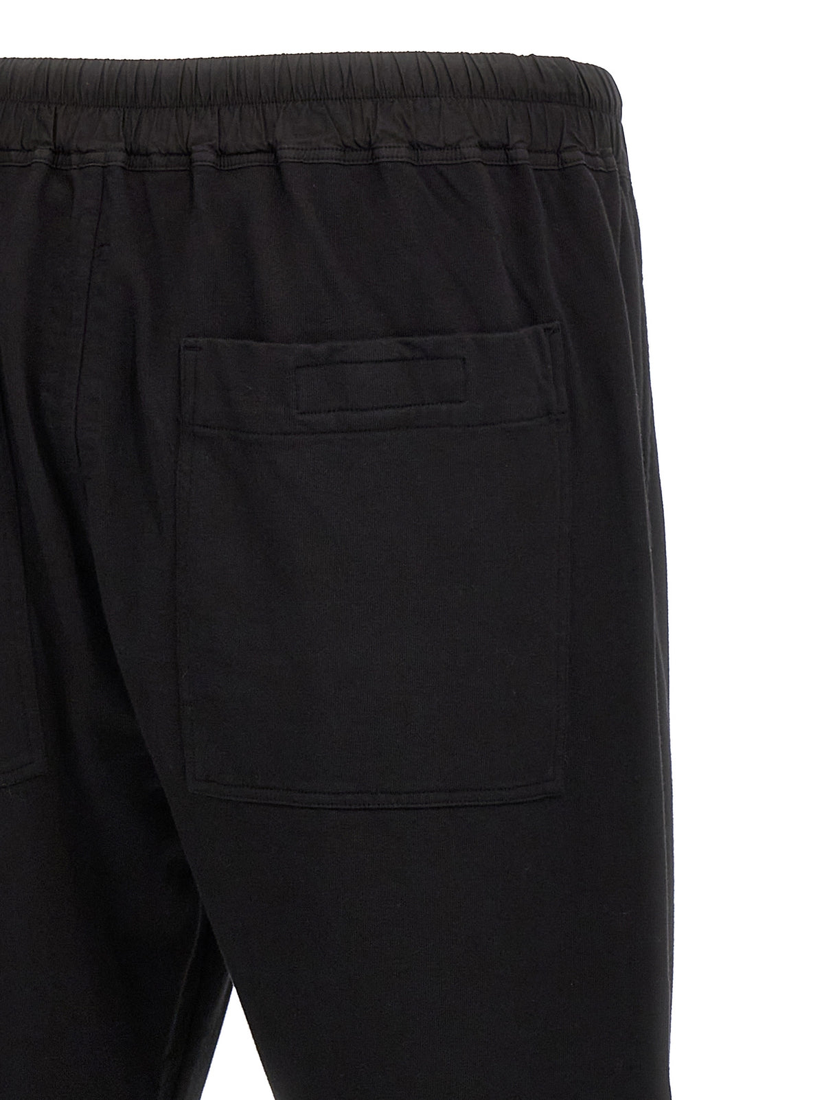 Casual Pants by DRKSHDW for men in cotton black presents a tailored silhouette, showcasing a tailored straight-leg and long cut with a refined for a truly tailored aesthetic.