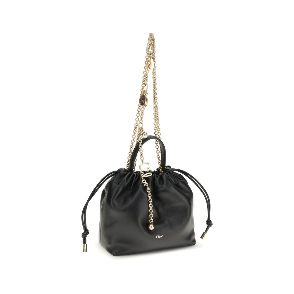 Compact Drawstring Shoulder Bag by Chloé for women in bos taurus nappa leather black, gold & signature presents a versatile silhouette, showcasing a secure drawstring and versatile with versatile shoulder-strap & handle for a sophisticated look.