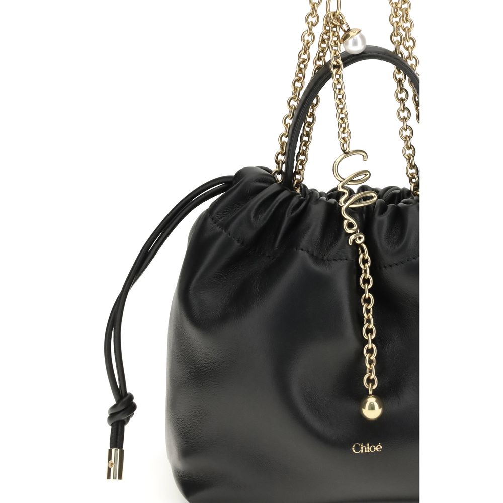 Compact Drawstring Shoulder Bag by Chloé for women in bos taurus nappa leather black, gold & signature presents a versatile silhouette, showcasing a secure drawstring and versatile with versatile shoulder-strap & handle for a sophisticated look.