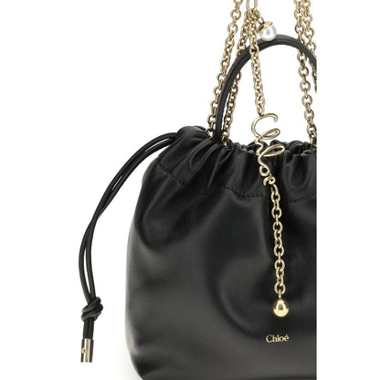 Compact Drawstring Shoulder Bag by Chloé for women in bos taurus nappa leather black, gold & signature presents a versatile silhouette, showcasing a secure drawstring and versatile with versatile shoulder-strap & handle for a sophisticated look.