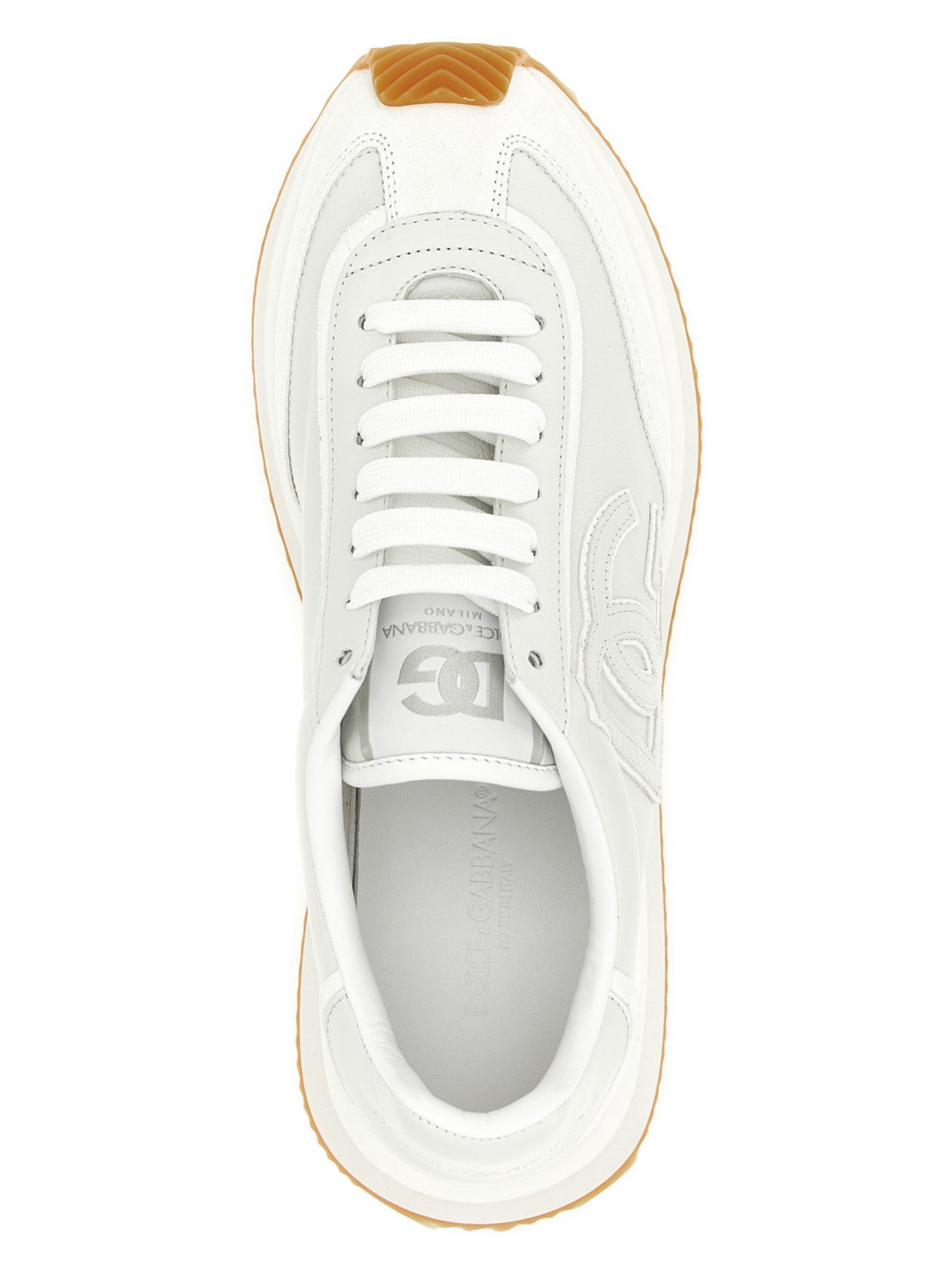 Sneakers by Dolce & Gabbana for men in tu & calfskin leather white presents a sumptuous silhouette, artfully capturing the essence of the Men's Low Top TU & Calfskin Leather Sneakers with its sumptuous low-top style design.