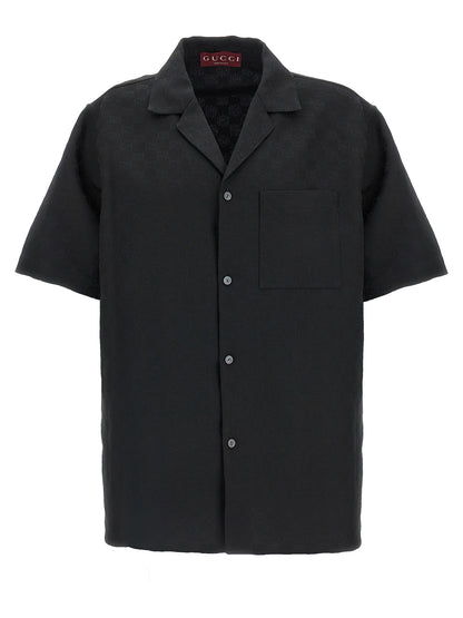 Shirt by Gucci for men in linen & polyester black & jacquard showcases a sublime silhouette, artfully detailed with a sublime v-neck neckline and short-sleeve for a sophisticated, sublime finish.