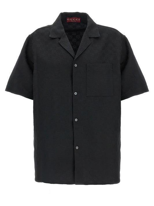 Shirt by Gucci for men in linen & polyester black & jacquard showcases a sublime silhouette, artfully detailed with a sublime v-neck neckline and short-sleeve for a sophisticated, sublime finish.