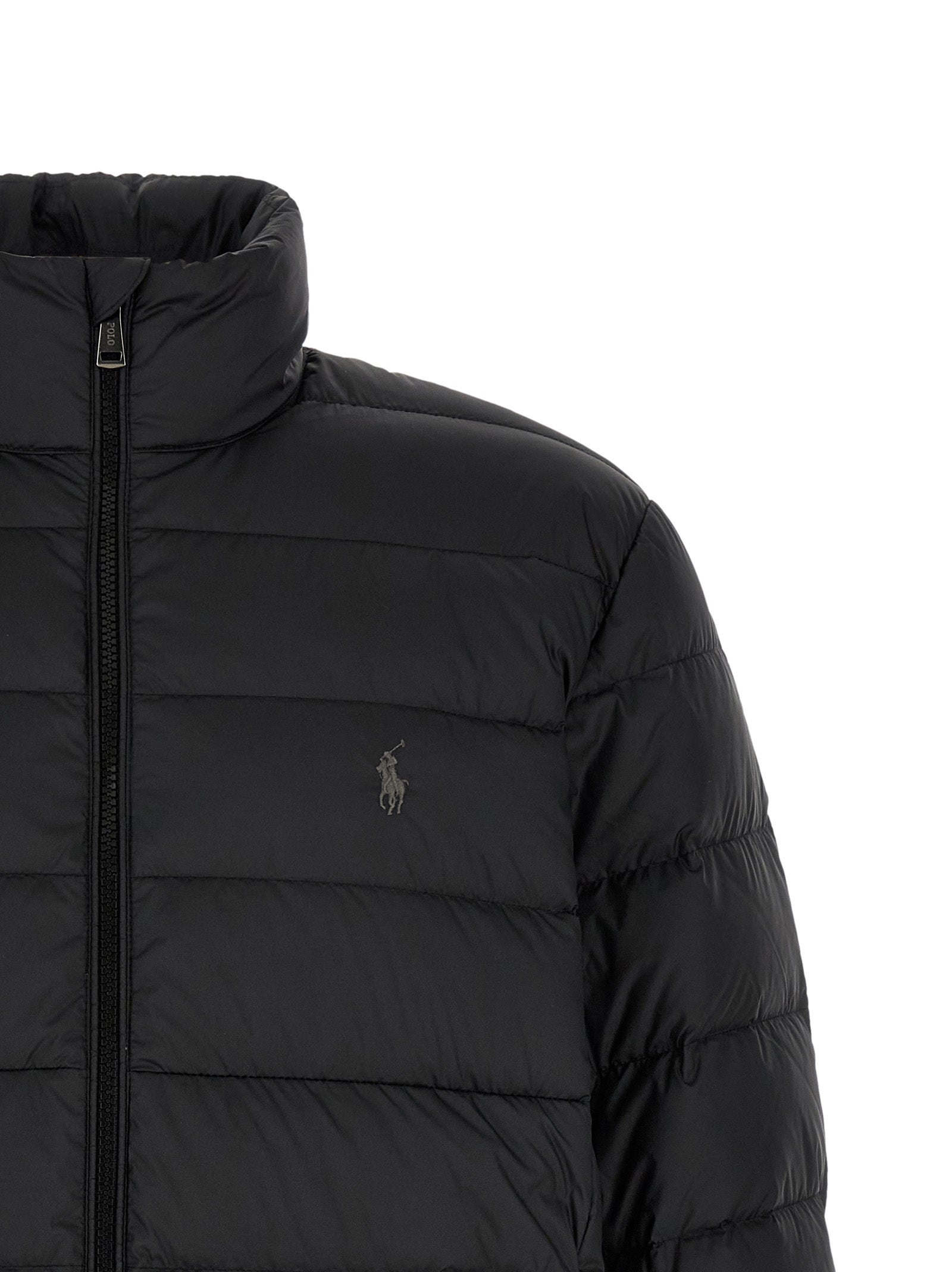 Puffer Jacket by Polo Ralph Lauren for men in polyester black showcases a bohemian silhouette, artfully detailed with a bohemian high-neck neckline and signature insulated for a truly bohemian finish.