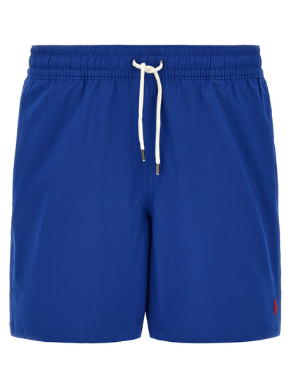 Swim Shorts from Polo Ralph Lauren for men in stretch polyester blue features an sleek silhouette, showcasing the distinct style of the Pony Men's Stretch Polyester Swim Shorts collection.