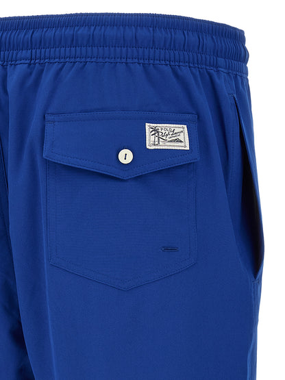 Swim Shorts by Polo Ralph Lauren for men in stretch polyester blue features a riviera-ready silhouette, showcasing the Pony Men's Stretch Polyester Swim Shorts design for a premium look.
