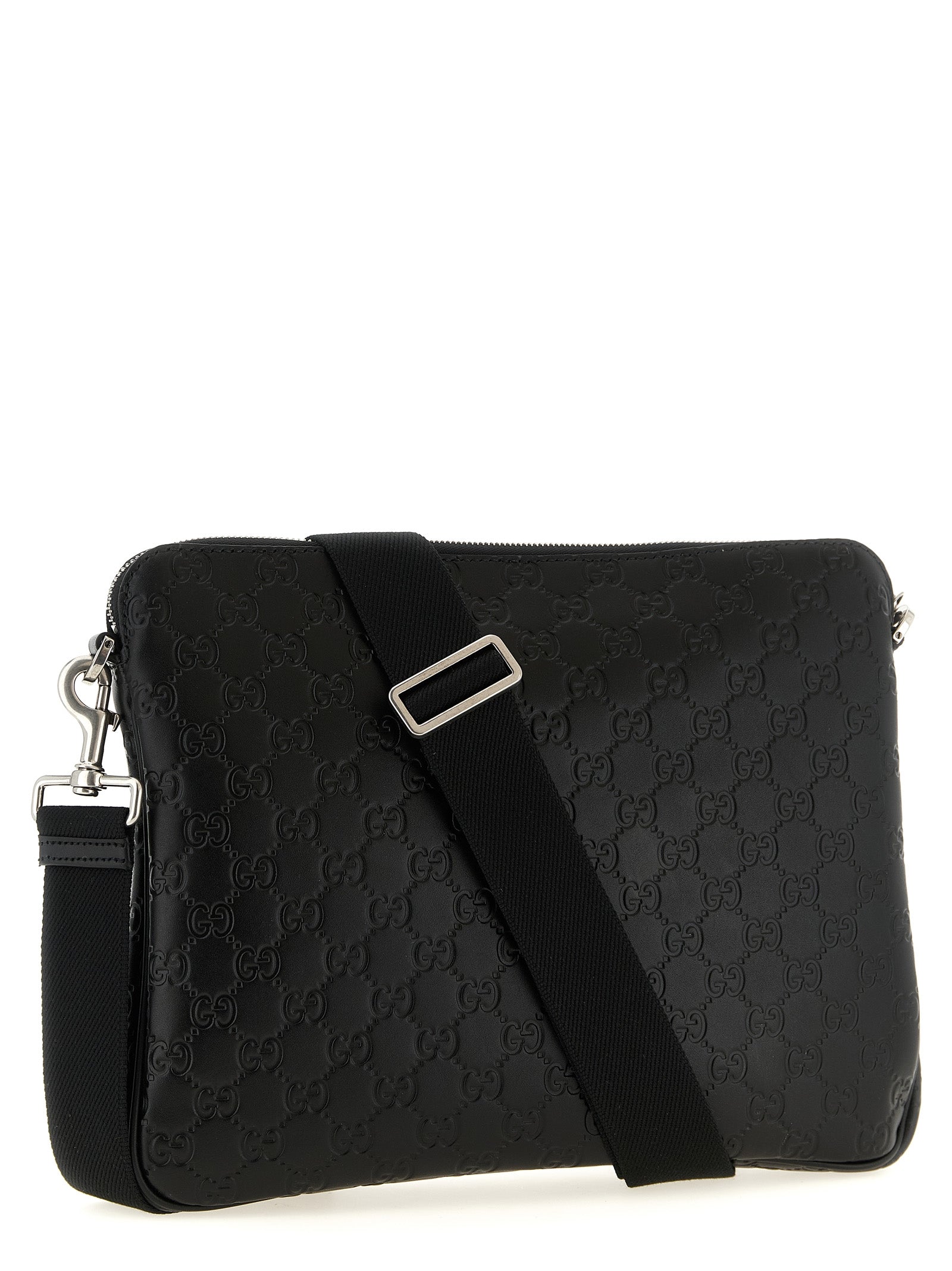 2-in-1 Shoulder & Crossbody Messenger Bag by Gucci for men in linen cotton & calfskin leather black, patterned & monogram features a artisanal Gg Linen Cotton & Calfskin Leather 2-in-1 Shoulder Crossbody Messenger Bag design with a secure zipper, ample , and versatile crossbody-strap & shoulder-strap for a artisanal finish.