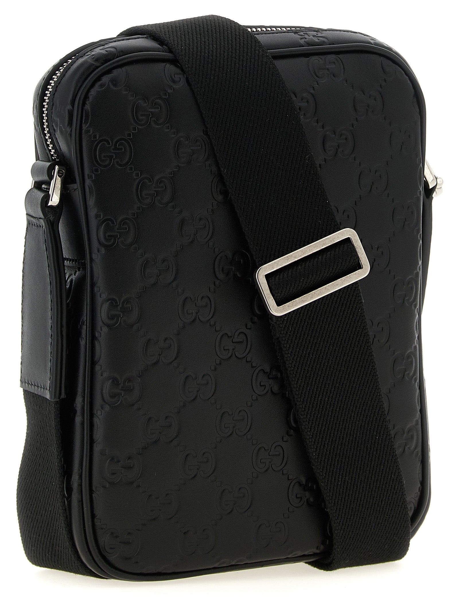 2-in-1 Shoulder & Crossbody Messenger Bag by Gucci for men in bos taurus calfskin leather black & patterned features a distinguished Gg Bos Taurus Calfskin Leather 2-in-1 Shoulder & Crossbody Messenger Bag design with a secure zipper, ample , and versatile crossbody-strap, shoulder-strap & adjustable-strap for a distinguished look.