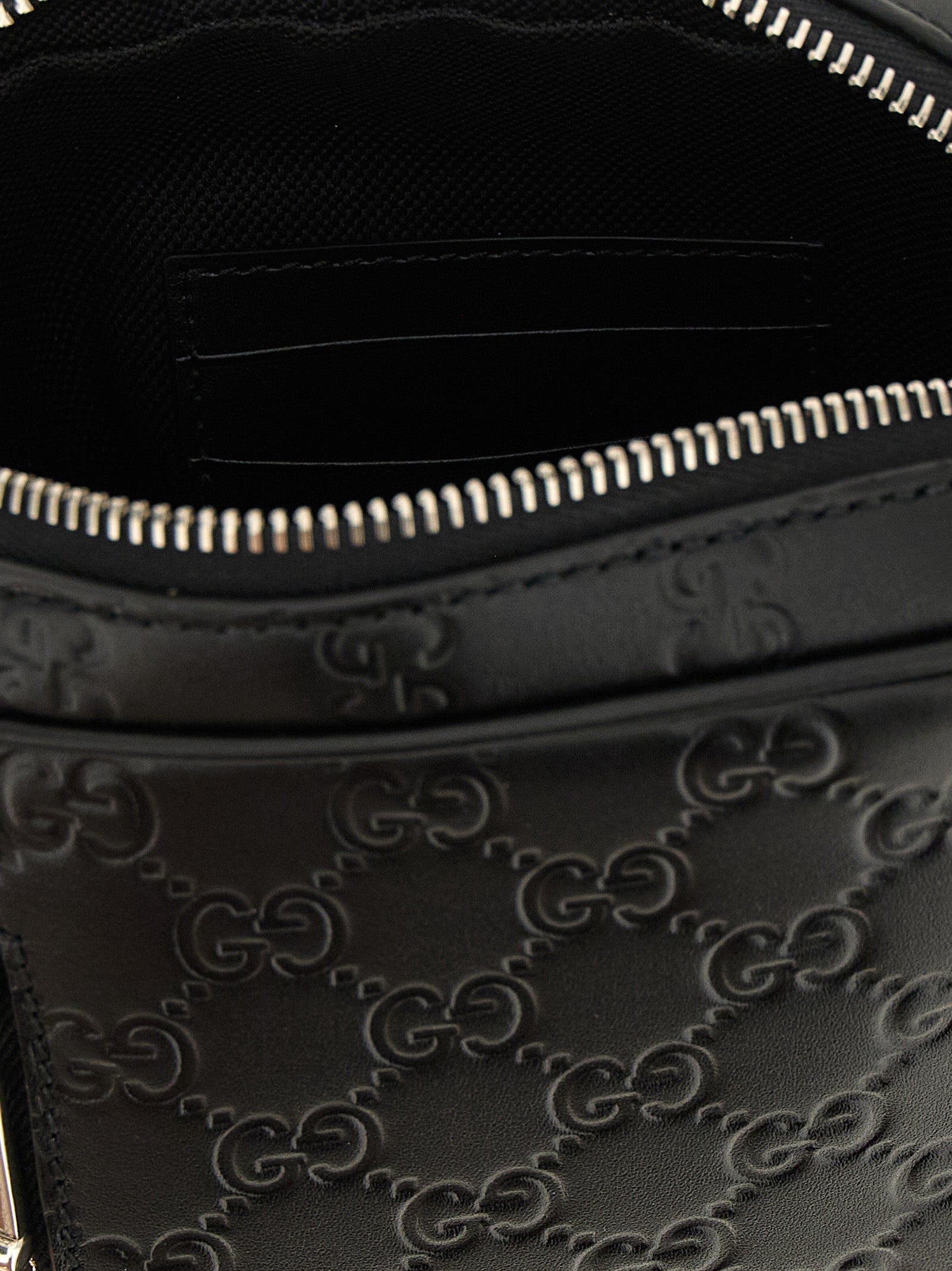 2-in-1 Shoulder & Crossbody Messenger Bag by Gucci for men in bos taurus calfskin leather black & patterned showcases a stylish Gg Bos Taurus Calfskin Leather 2-in-1 Shoulder & Crossbody Messenger Bag design, featuring a secure zipper and ample with versatile crossbody-strap, shoulder-strap & adjustable-strap for a stylish look.
