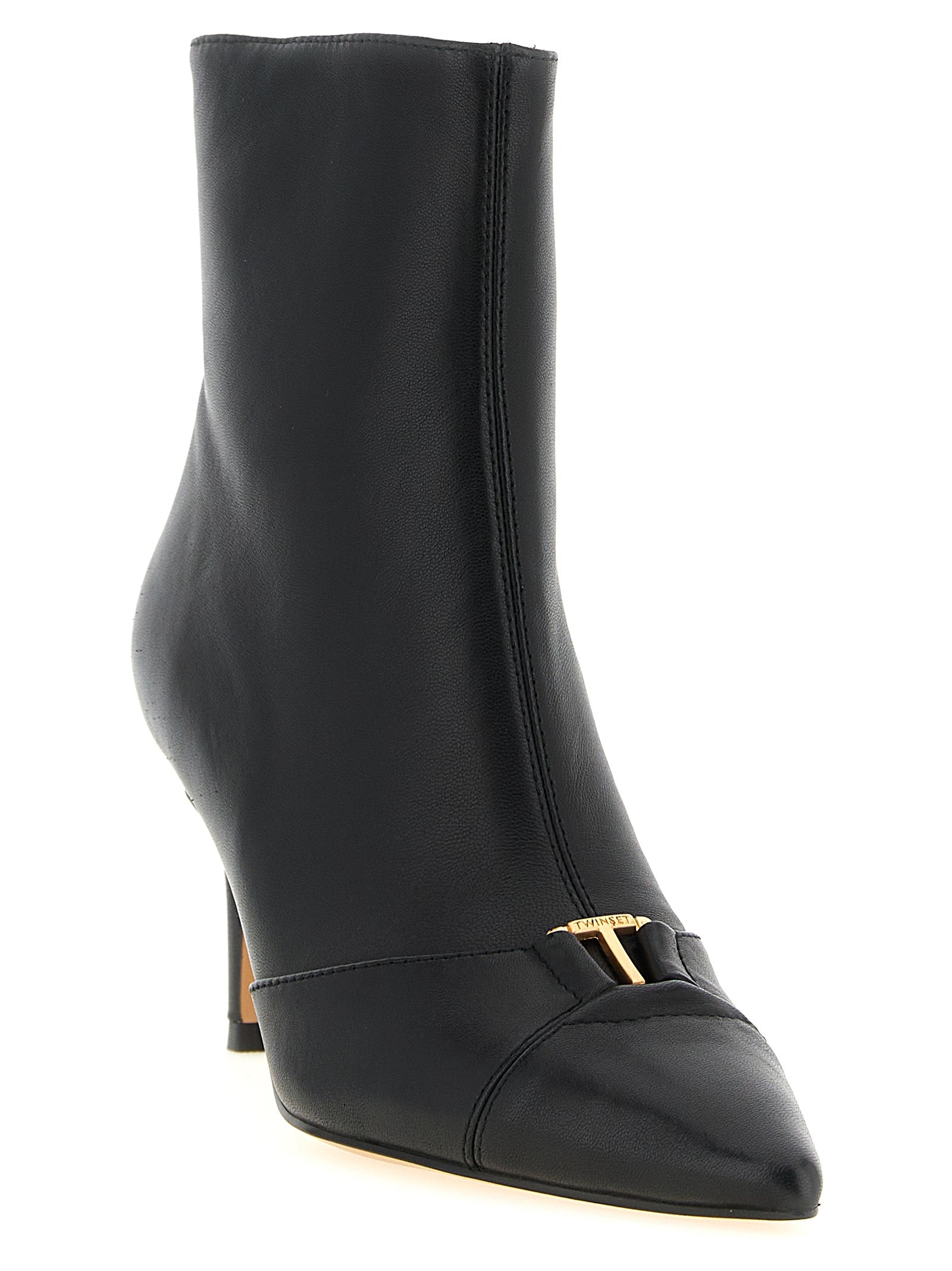 Stiletto Ankle Boots by Twinset for women in leather black & gold showcases a impeccable silhouette as Women's Leather Stiletto Ankle Boots, artfully defined by a impeccable stiletto and a impeccable .