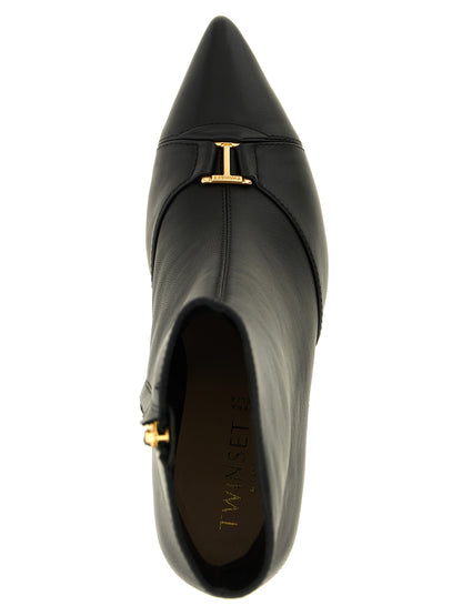 Stiletto Ankle Boots by Twinset for women in leather black & gold features an enchanting design from the Women's Leather Stiletto Ankle Boots collection, highlighting a enchanting stiletto and for a refined look.