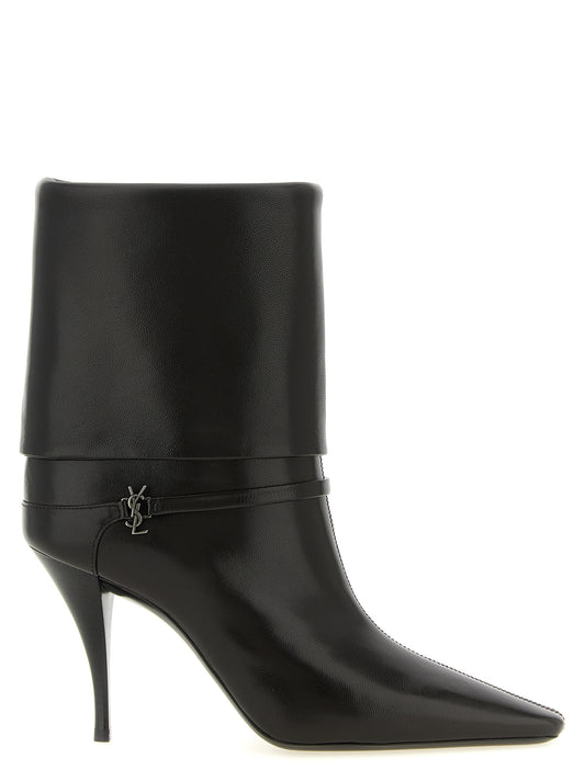 Stiletto Ankle Strap Boots by Saint Laurent for women in plush lamb leather brown features an effortless chic silhouette from the Cassandre Niki Women's Plush Lamb Leather Stiletto Ankle Strap Boots collection, showcasing a effortless chic stiletto and refined for an effortless chic look.