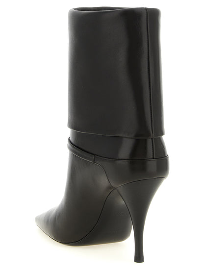 Stiletto Ankle Strap Boots by Saint Laurent for women in plush lamb leather brown showcases a ergonomic silhouette from the Cassandre Niki Women's Plush Lamb Leather Stiletto Ankle Strap Boots collection, featuring a ergonomic stiletto and a ergonomic .