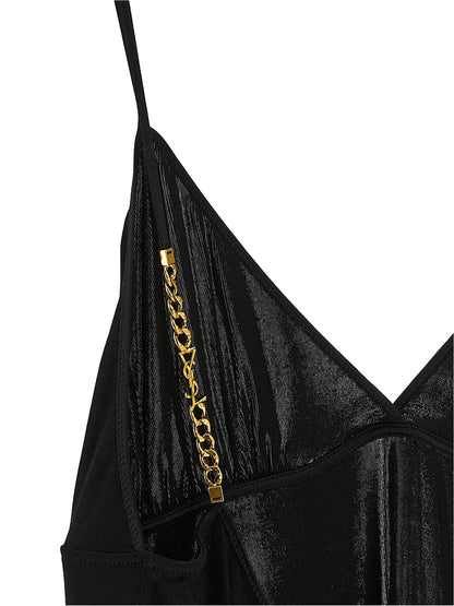 Tank Top by Saint Laurent for women in viscose satin black & gold presents a uncompromising silhouette, artfully detailed with a uncompromising and for a sophisticated, uncompromising finish.