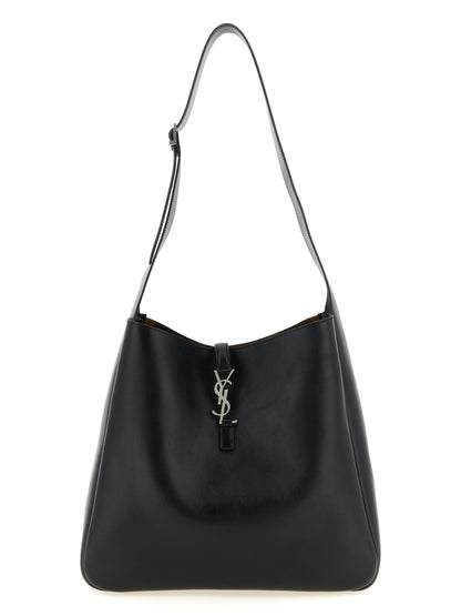 Hobo Clutch Shoulder Bag by Saint Laurent for men in bos taurus suede calf leather black & silver features a distinguished silhouette, showcasing a secure zipper & hook and distinguished with versatile shoulder-strap & adjustable-strap for a distinguished finish.