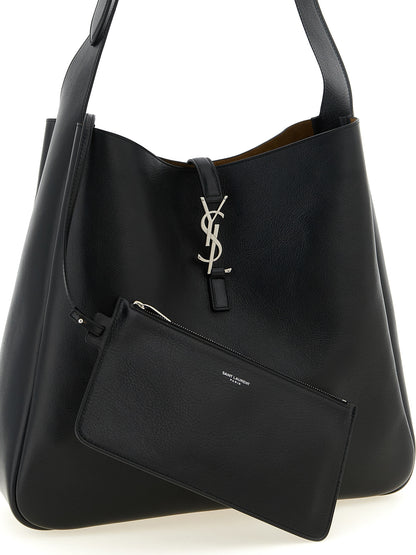 Hobo Clutch Shoulder Bag by Saint Laurent for men in bos taurus suede calf leather black & silver features an effortlessly chic silhouette with a secure zipper & hook, ample , and versatile shoulder-strap & adjustable-strap for effortlessly chic everyday luxury.