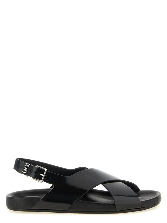 Flat Slingback Sandals by Saint Laurent for men in bos taurus calfskin leather black & silver features an effortlessly chic silhouette from the Cassandre Men's Bos Taurus Calfskin Leather Flat Slingback Sandals collection, showcasing a effortlessly chic flat and elegant .