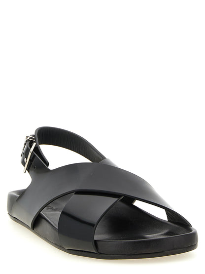 Flat Slingback Sandals by Saint Laurent for men in bos taurus calfskin leather black & silver features an exquisite silhouette, showcasing the exquisite Cassandre Men's Bos Taurus Calfskin Leather Flat Slingback Sandals with a flat and .