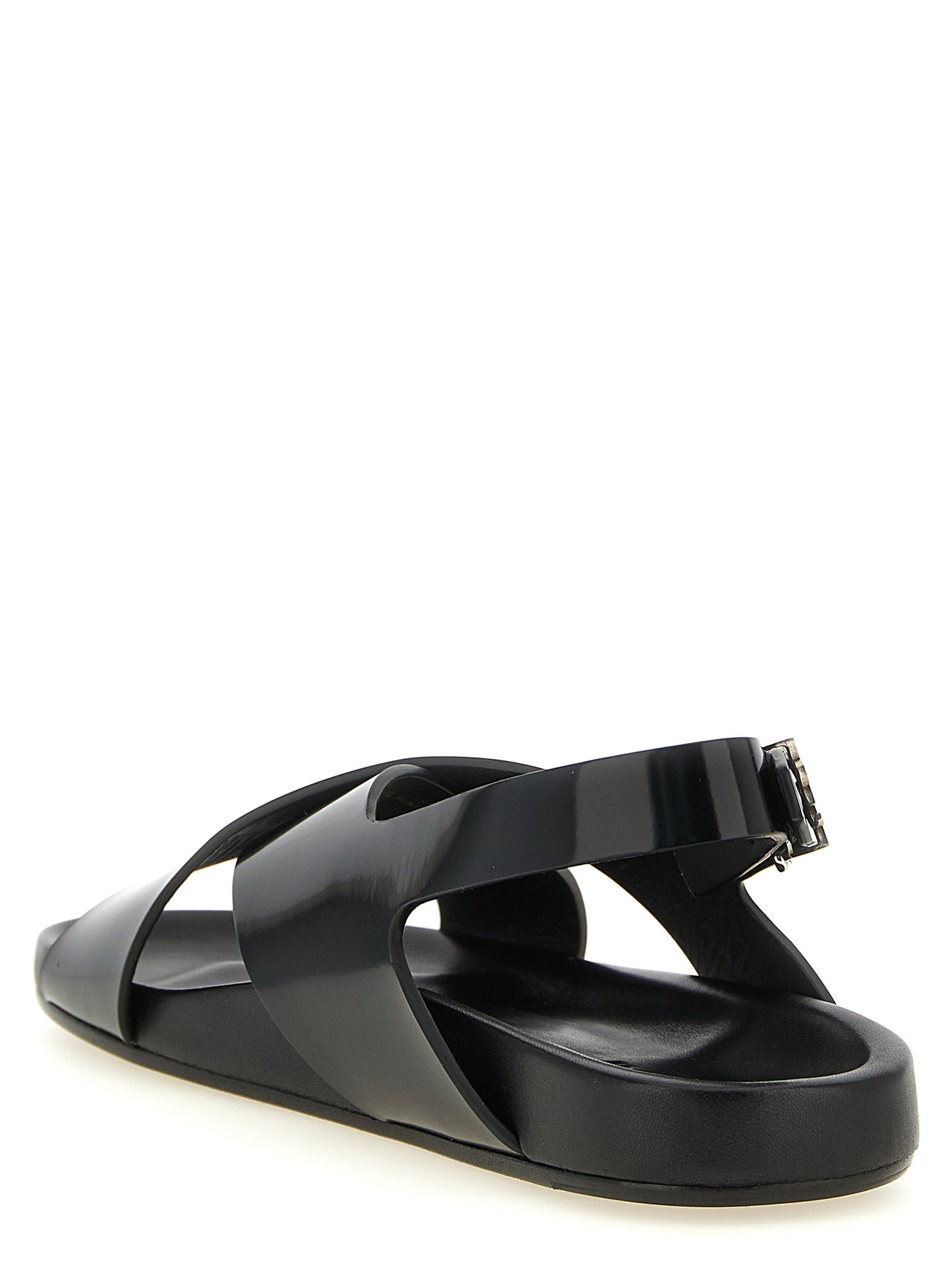 Flat Slingback Sandals by Saint Laurent for men in bos taurus calfskin leather black & silver features an statuesque Cassandre Men's Bos Taurus Calfskin Leather Flat Slingback Sandals silhouette with a refined flat and elegant .