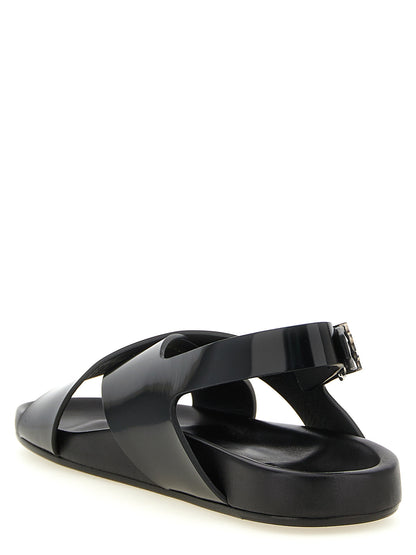 Flat Slingback Sandals by Saint Laurent for men in bos taurus calfskin leather black & silver features an statuesque Cassandre Men's Bos Taurus Calfskin Leather Flat Slingback Sandals silhouette with a refined flat and elegant .