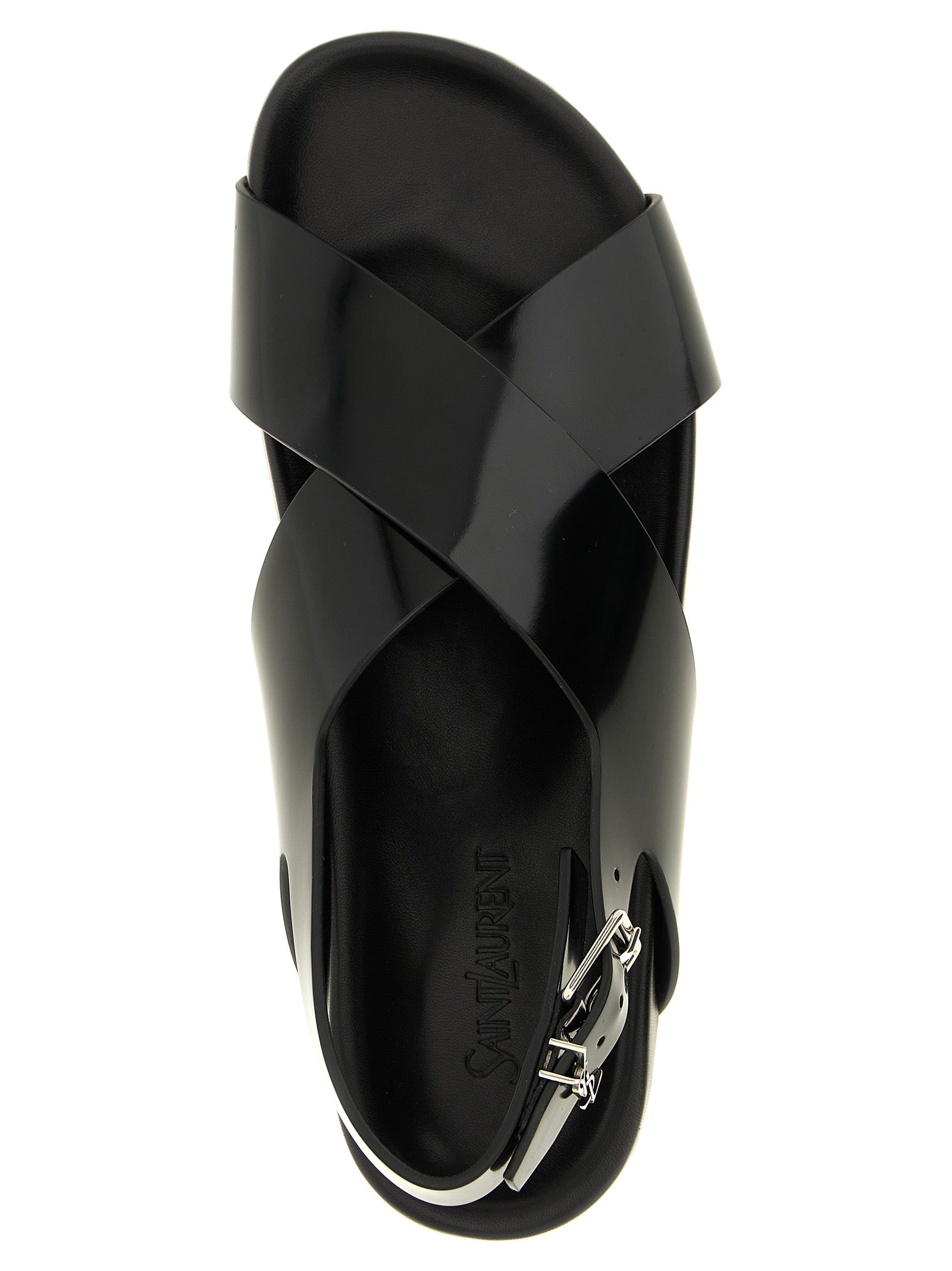 Flat Slingback Sandals by Saint Laurent for men in bos taurus calfskin leather black & silver presents a sculptural silhouette, showcasing the Cassandre Men's Bos Taurus Calfskin Leather Flat Slingback Sandals design with a sculptural flat and for a premium look.
