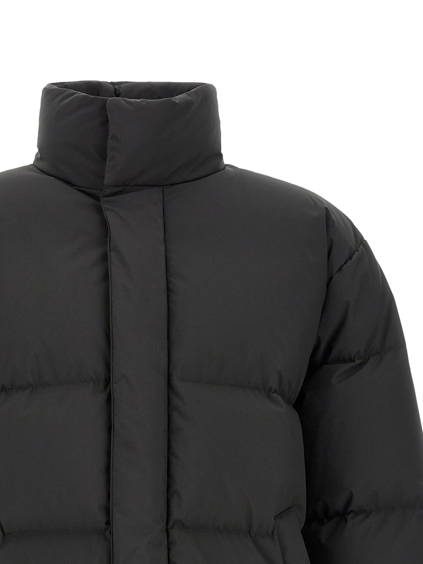 Puffer Jacket by Saint Laurent for men in polyester black features a city-ready silhouette, detailed with pockets & insulated and a city-ready high-neck neckline.