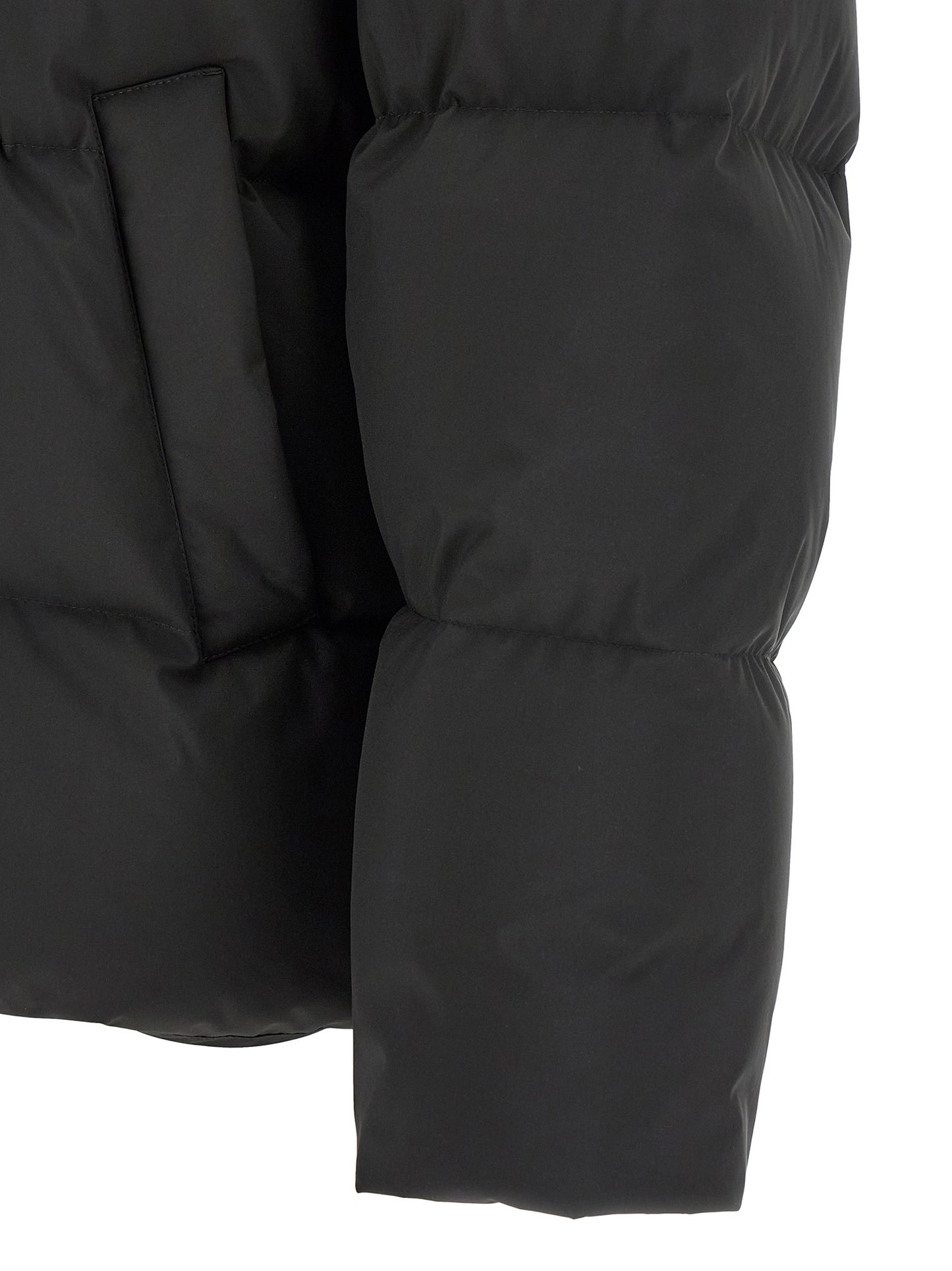 Puffer Jacket by Saint Laurent for men in polyester black presents a effortlessly chic silhouette, showcasing a sophisticated and premium pockets & insulated for a truly effortlessly chic finish.