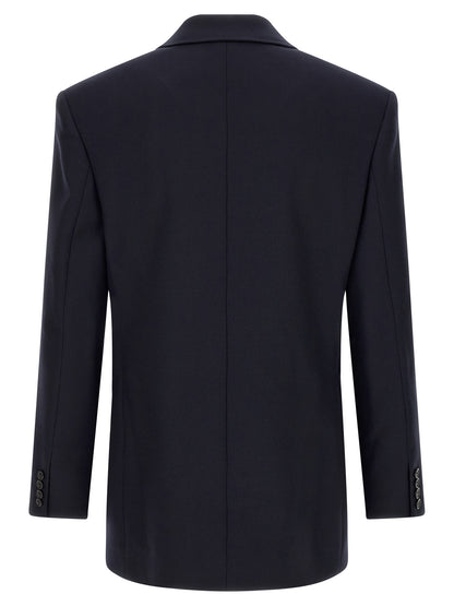 Blazer by Saint Laurent for men in wool navy showcases a polished silhouette, highlighted by a refined and polished for a sophisticated finish.